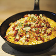 Baked polenta with pears and pancetta