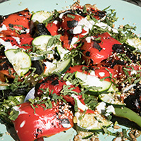 Charred summer chiles and cucumbers with herbs and tahini