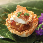 Caramelized fennel tartlets with prosciutto and goat cheese