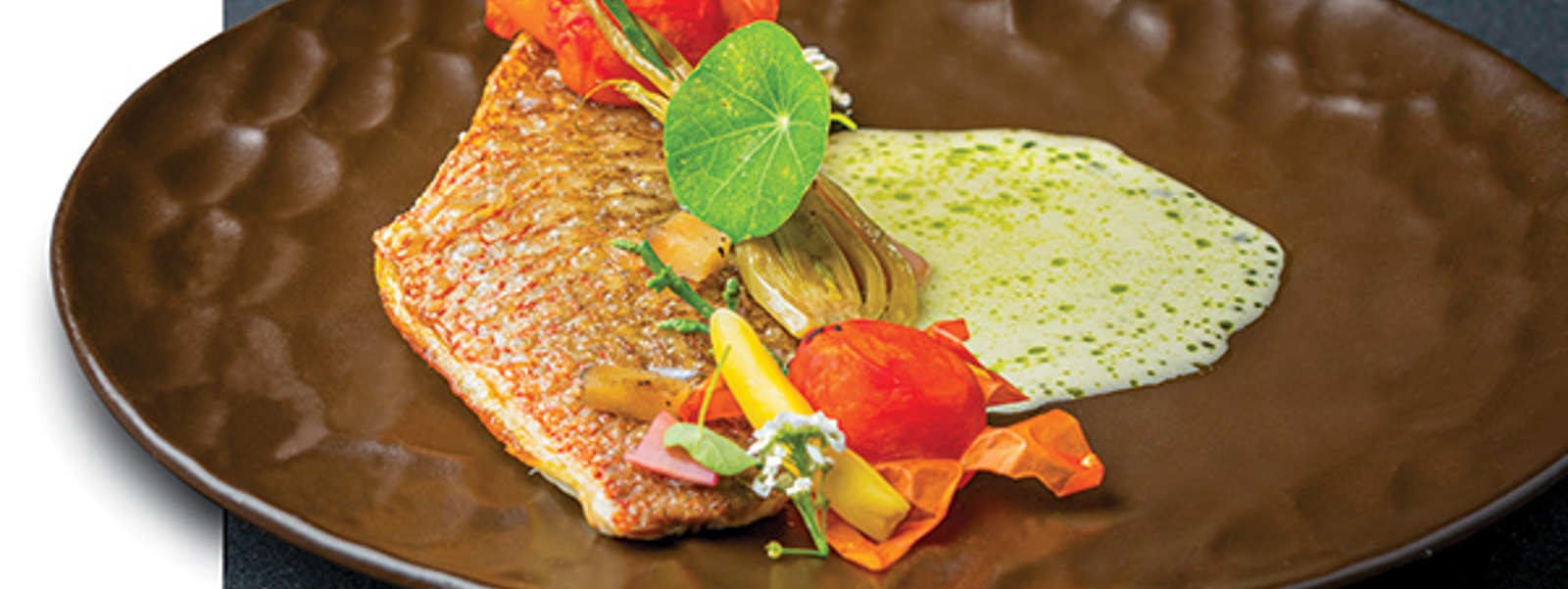 Crispy snapper with white mole and confit vegetables