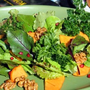 Salad of Fuyu persimmons and autumn green