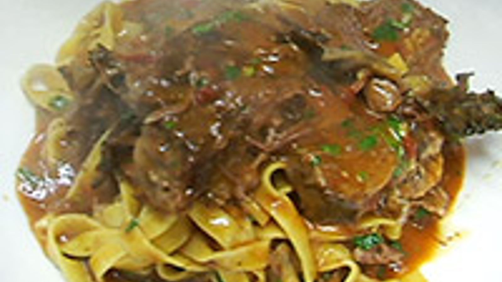 Braised short ribs with tagliatelle pasta