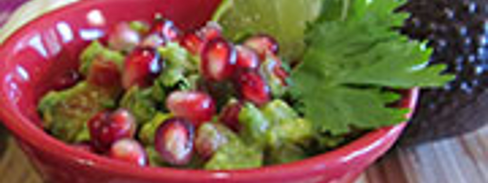 Fresh guacamole with pomegranates