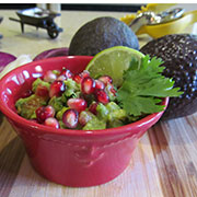 Fresh guacamole with pomegranates