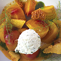 Roasted beet salad with herbed chevre, honeycomb and orange-beet reduction