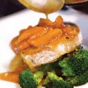 Pan-seared pork medallions with apricot-brandy reduction