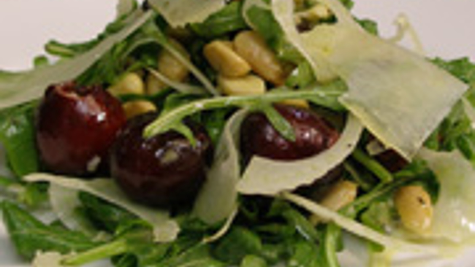 Cherry, almond and arugula salad with white balsamic vinaigrette and Pecorino Lucano