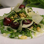 Cherry, almond and arugula salad with white balsamic vinaigrette and Pecorino Lucano