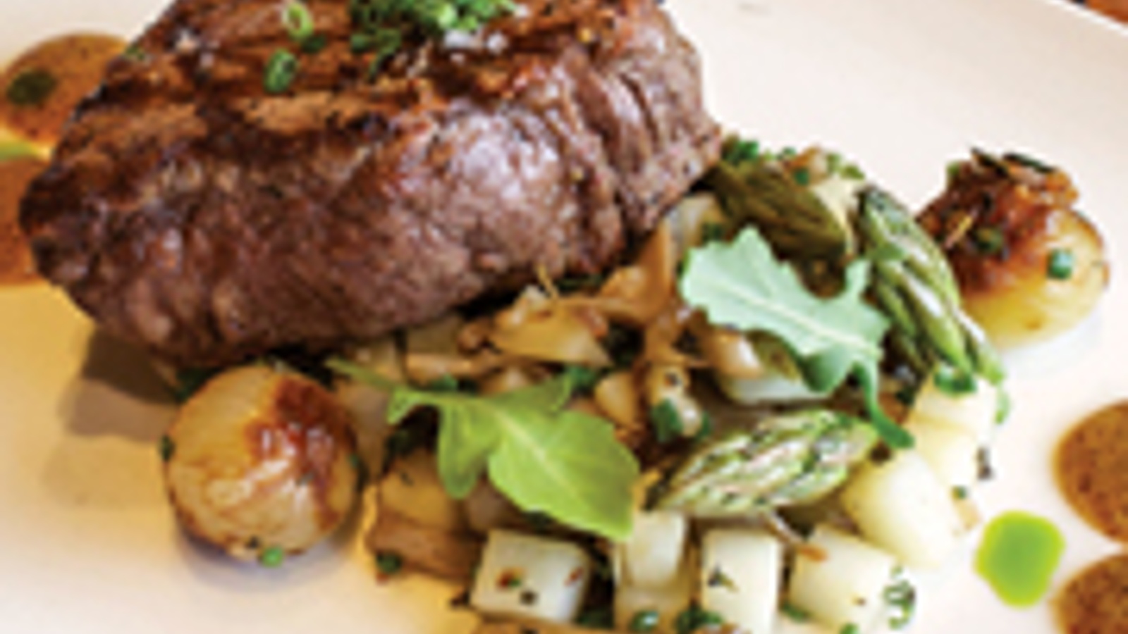 Filet mignon with potatoes, vegetables and maple mustard