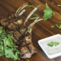 Charbroiled lamb lollipops with cumin-coriander yogurt