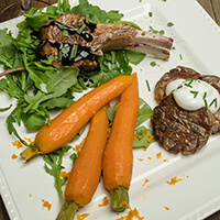 Rosemary and thyme pan-seared rack of lamb with port reduction glaze