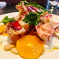 Mixed chicory salad with citrus, burrata and sherry vinaigrette