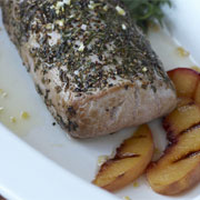 Herb roasted pork loin with grilled peaches and limoncello glaze