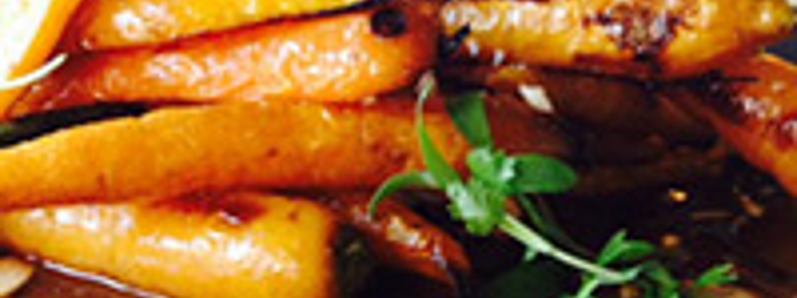 Oven-roasted baby carrots with mole sauce