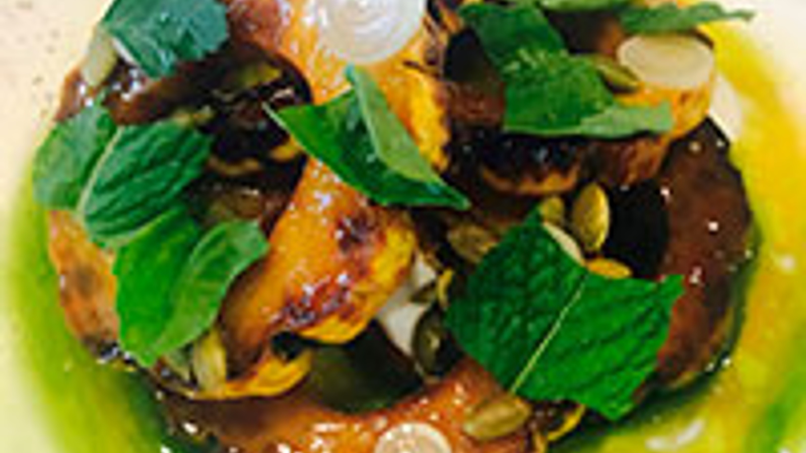 Roasted delicata squash with pickled ramps, buttermilk, pumpkin seeds and herbs