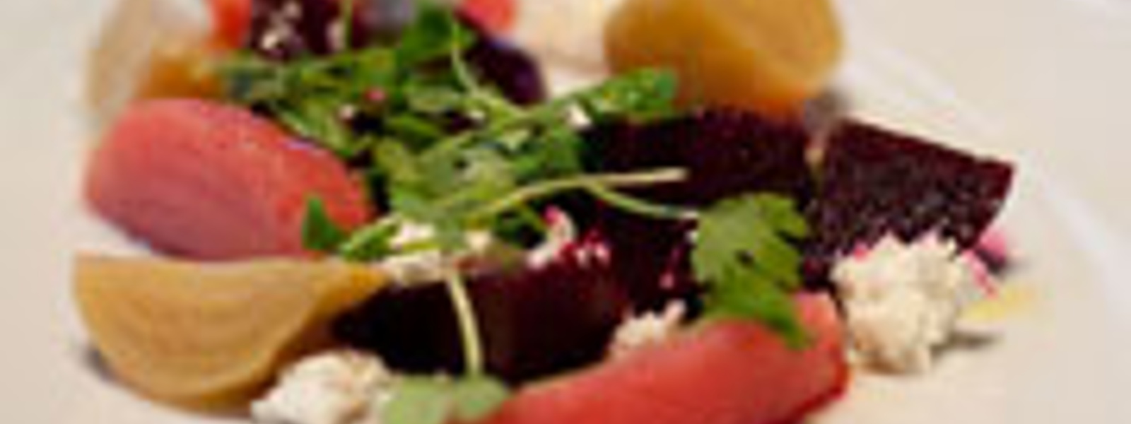 Marinated beets with arugula, goat cheese and white truffle oil