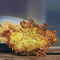 Chive-scented potato latkes with chunky heirloom applesauce