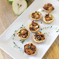 Pear Gouda tarts with caramelized onion appetizer recipe