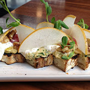 Burrata on grilled bread with garbanzo beans, Asian pear and walnuts