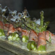 Grilled asparagus wrapped with prosciutto and parmesan snow