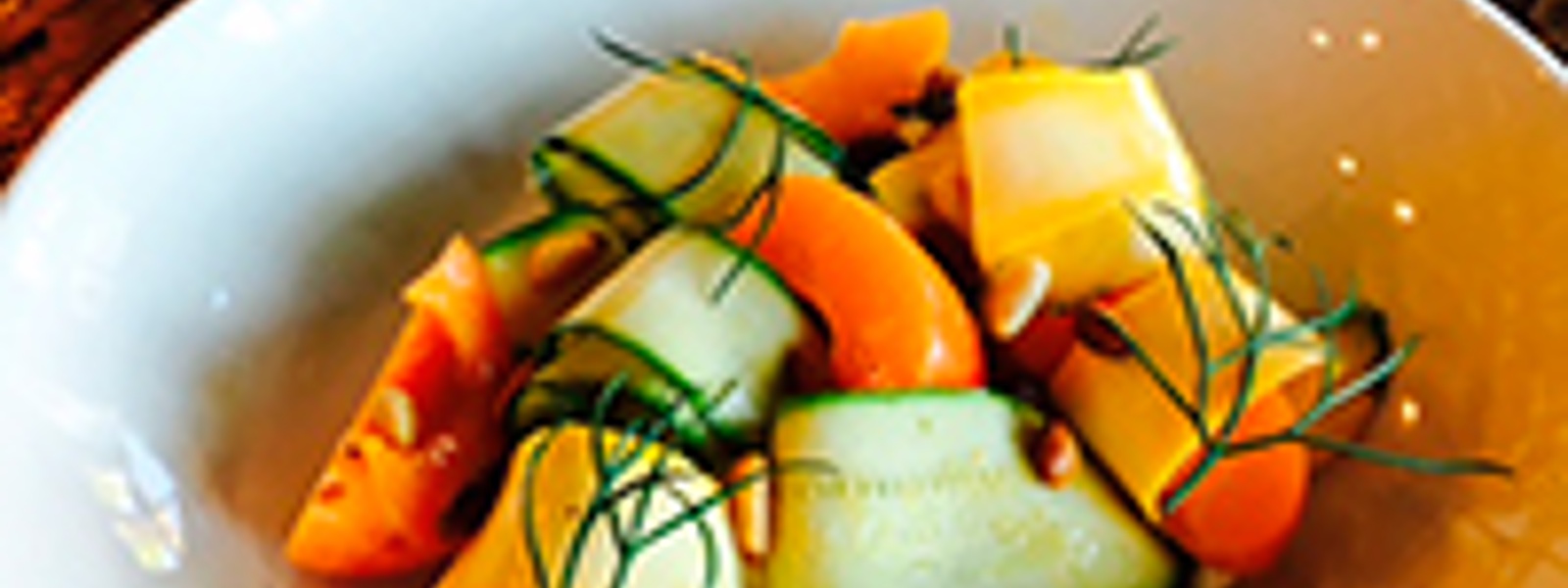 Summer burrata salad with shaved squash, apricots and rosemary vinaigrette