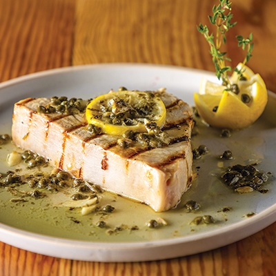 Grilled swordfish with lemon caper sauce