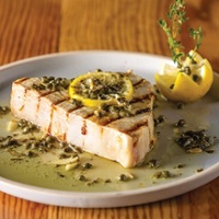 Grilled swordfish with lemon caper sauce