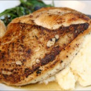 Pan-roasted chicken breast with braising kale and polenta