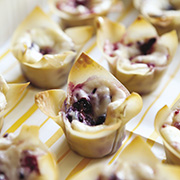 Mini berry amaretto cheesecakes