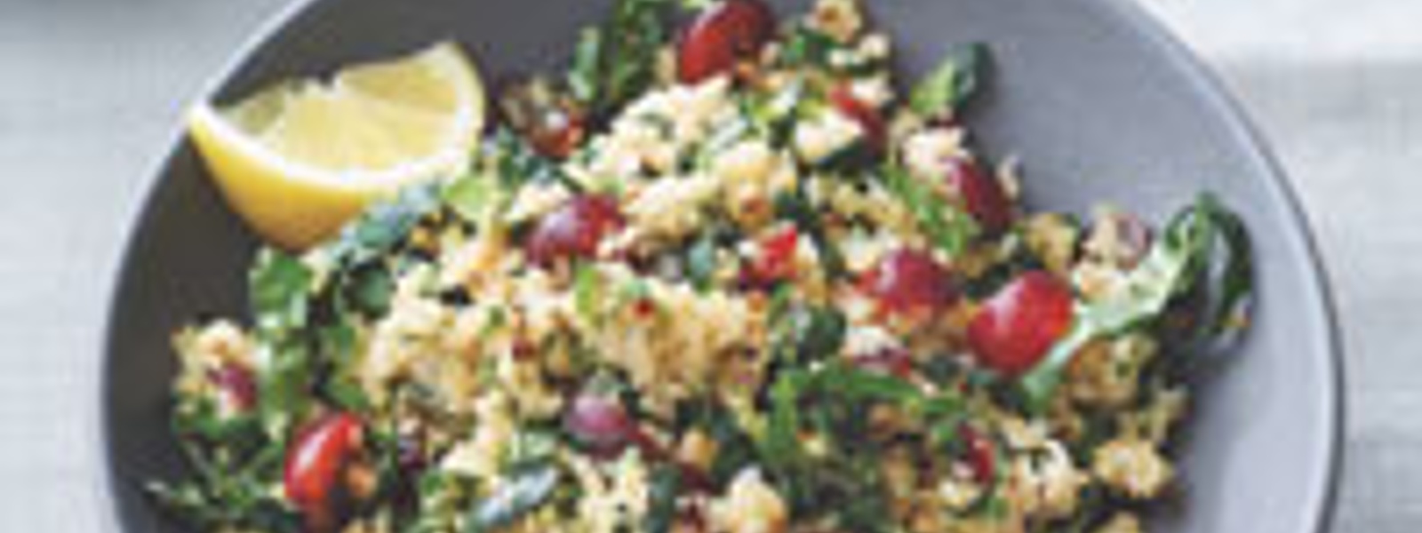 Kale quinoa salad with red grapes