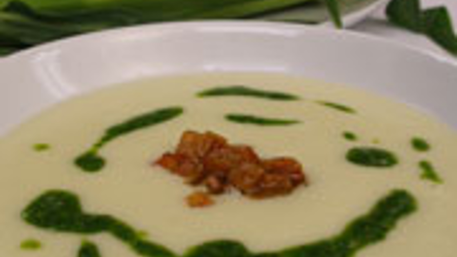 Hawks sweet corn soup with roasted peppers and basil pistou