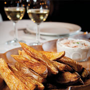 Smoky potato wedges with bacon cream dip