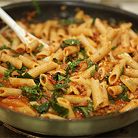 Whole wheat penne with chorizo and fresh kale